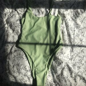 Green polka dot one piece swim suit